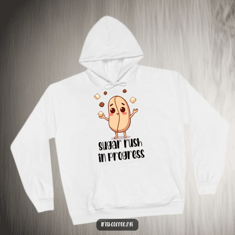Funny hoodie featuring a curious coffee bean character in the act of juggling small sugar cubes, perfect for coffee lovers.